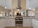 Modern kitchen featuring granite countertops and stainless steel appliances at 9702 Mary Robin Dr, Riverview, FL 33569