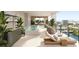 Private balcony features a plunge pool, lounge area, and stunning waterfront views at 111 S Ashley Dr # 2503, Tampa, FL 33602