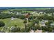 Overhead aerial view of the property surrounded by a picturesque neighborhood at 1110 Mercer Loop, Plant City, FL 33567