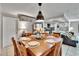 Comfortable dining area featuring seating for six, with a kitchen view and ample natural light at 1110 Mercer Loop, Plant City, FL 33567
