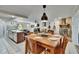 Open-concept dining area with views into the kitchen and living area, ideal for entertaining at 1110 Mercer Loop, Plant City, FL 33567