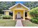 Inviting entrance with decorated porch and well-manicured lawn at 1110 Mercer Loop, Plant City, FL 33567