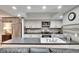 Bright kitchen featuring white cabinetry, stainless steel appliances, and a sleek countertop with a sink at 1110 Mercer Loop, Plant City, FL 33567