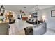 Spacious living room with tile floors and fireplace at 1110 Mercer Loop, Plant City, FL 33567