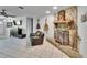 The living room has a stone fireplace and wood accents at 1110 Mercer Loop, Plant City, FL 33567