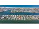 Waterfront property with a private dock along a serene canal community at 11225 4Th E St, Treasure Island, FL 33706