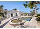 Backyard with pool, spa and outdoor seating at 11225 4Th E St, Treasure Island, FL 33706