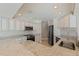 Kitchen featuring custom cabinets, stainless steel appliances, granite countertops, and an undermount sink at 11225 4Th E St, Treasure Island, FL 33706