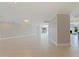 Spacious living room with tile floors, recessed lighting and great natural light at 11225 4Th E St, Treasure Island, FL 33706