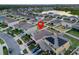Aerial view of property with solar panels, beautiful backyard and landscaping at 12017 Gillingham Harbor Ln, Gibsonton, FL 33534