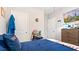 Well-organized bedroom featuring a full bed, cheerful decor, and an aquarium, creating a comfortable space at 12017 Gillingham Harbor Ln, Gibsonton, FL 33534