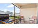Inviting screened patio with outdoor furniture and grilling area, perfect for relaxing at 12017 Gillingham Harbor Ln, Gibsonton, FL 33534