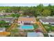 Aerial view of the backyard featuring a large swimming pool and fenced-in area at 1320 Oak Valley Dr, Seffner, FL 33584