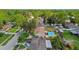Aerial view of the backyard and a home with a large pool at 1320 Oak Valley Dr, Seffner, FL 33584