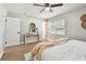 Comfortable bedroom featuring a large window, and neutral decor at 1320 Oak Valley Dr, Seffner, FL 33584