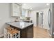 Updated kitchen with sleek countertops, modern cabinetry, and stylish lighting at 1320 Oak Valley Dr, Seffner, FL 33584