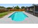 Outdoor swimming pool surrounded by green grass and a fence at 1320 Oak Valley Dr, Seffner, FL 33584