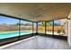 View of the screened porch leading to the pool area at 1320 Oak Valley Dr, Seffner, FL 33584