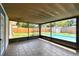 View of the screened porch overlooking the pool at 1320 Oak Valley Dr, Seffner, FL 33584