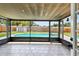 Screened porch overlooks backyard pool at 1320 Oak Valley Dr, Seffner, FL 33584