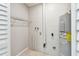 Utility room features a water heater and storage rack at 1320 Oak Valley Dr, Seffner, FL 33584