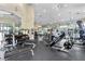 Spacious fitness center with state-of-the-art equipment and mirrored walls, designed for a comprehensive workout experience at 18004 Avalon Ln, Tampa, FL 33647