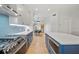 Gourmet kitchen with modern appliances and ample counter space with easy access to a dining area at 18004 Avalon Ln, Tampa, FL 33647