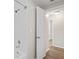 Bathroom featuring white subway tile in the shower with an open door at 1826 Cadillac Cir, Tampa, FL 33619