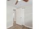Bedroom featuring hardwood floors and a closet with an open door at 1826 Cadillac Cir, Tampa, FL 33619
