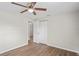 Bedroom featuring hardwood floors and a closet, providing ample storage at 1826 Cadillac Cir, Tampa, FL 33619