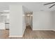 Inviting interior hallway featuring modern flooring and neutral paint at 1826 Cadillac Cir, Tampa, FL 33619