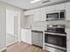 Updated kitchen features stainless steel appliances and plenty of storage at 1826 Cadillac Cir, Tampa, FL 33619