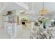 Open kitchen with view into the Gathering room and dining room at 18561 Winding Oaks Blvd, Hudson, FL 34667