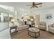 Inviting living room with a fireplace, comfortable seating, and an open layout, perfect for relaxing and entertaining at 18561 Winding Oaks Blvd, Hudson, FL 34667