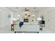 Cozy living room features a fireplace, elegant decor, and ample natural light, creating a warm atmosphere at 18561 Winding Oaks Blvd, Hudson, FL 34667
