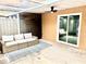 Cozy outdoor patio with comfortable seating, perfect for relaxing and enjoying the outdoor space at 1884 Clearbrooke Dr, Clearwater, FL 33760