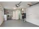 Unfinished basement featuring water heater, furnace, and storage shelves at 2005 Jefferson Ave, Dunedin, FL 34698