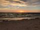 Breathtaking beach sunset, inviting residents to unwind and enjoy coastal living at 2005 Jefferson Ave, Dunedin, FL 34698