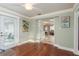 Dining room with hardwood flooring and door leading to patio at 2005 Jefferson Ave, Dunedin, FL 34698