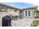 Patio with pavers, chairs and grill at 2005 Jefferson Ave, Dunedin, FL 34698