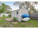 Exterior view of a shed, complete with a small wooden porch, storage at 2005 Jefferson Ave, Dunedin, FL 34698