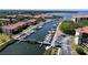 Aerial view of the community marina with boat slips and waterfront condos at 244 & 243 Mariner Dr # 243-244, Tarpon Springs, FL 34689