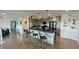 Bright kitchen with a large kitchen island and modern stainless steel appliances at 244 & 243 Mariner Dr # 243-244, Tarpon Springs, FL 34689