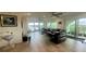 Living room with sliding glass doors leading to the outside at 244 & 243 Mariner Dr # 243-244, Tarpon Springs, FL 34689