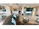 Living room featuring a view of the kitchen at 244 & 243 Mariner Dr # 243-244, Tarpon Springs, FL 34689