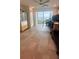 Versatile room with a ceiling fan, desk area, and exercise equipment, offering a flexible living space at 244 & 243 Mariner Dr # 243-244, Tarpon Springs, FL 34689