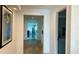Inviting hallway with neutral tones, leading to different areas of the home at 244 Mariner Dr, Tarpon Springs, FL 34689
