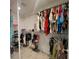 Spacious walk-in closet with ample shelving and hanging space for organized storage at 244 Mariner Dr, Tarpon Springs, FL 34689