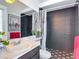 Sleek bathroom featuring a modern vanity, patterned shower, and stylish decor, creating a spa-like retreat at 28410 Wildlife Ln, Brooksville, FL 34602