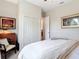 Comfortable bedroom featuring neutral tones, stylish furnishings, and a bright, inviting atmosphere at 28410 Wildlife Ln, Brooksville, FL 34602